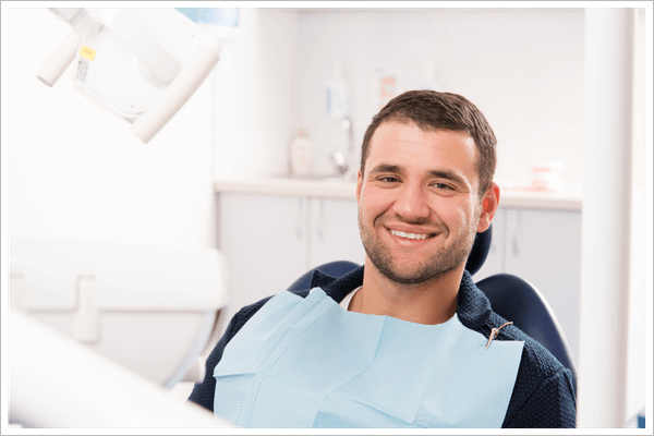 smiling patient at the dentist